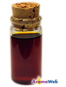 Bottle Depicting the Typical Color of Agarwood (Oud) Essential Oil