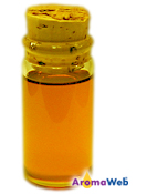 Bottle Depicting the Typical Color of Tagetes Essential Oil