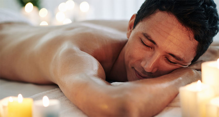 Man Enjoying an Aromatherapy Massage